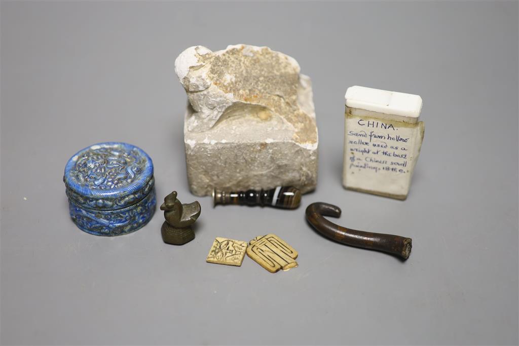 A group of Chinese and Japanese objects, 19th/20th century, including an inscribed ink box an inkstone, a lacquer bookslide, two Tibeta